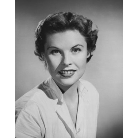 Portrait of a young woman smiling Poster Print