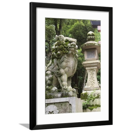 A Guardian Stone Lion Traditional Stone Lantern at the Entrance to Kasuga-Taisha Shrine Framed Print Wall Art By Paul Dymond