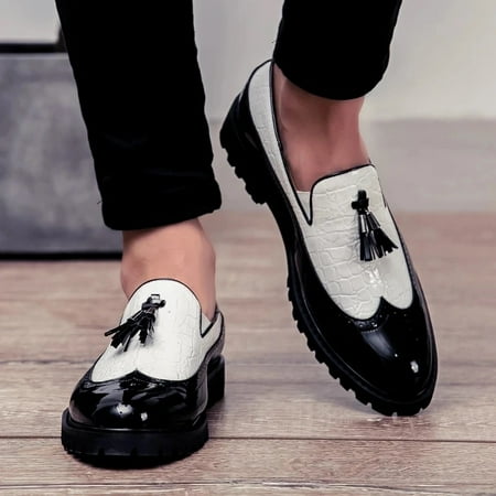 Black and White wingtip loafers with tassels shoes unisex shoe size 38
Black and White wingtip loafers with tassels shoes unisex shoe size 38