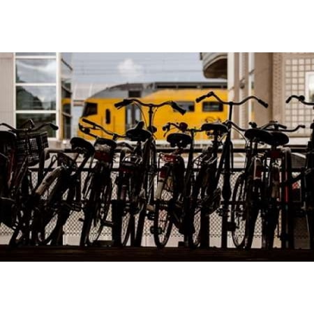 Bicycles at Centraal Station Poster Print by Erin Berzel