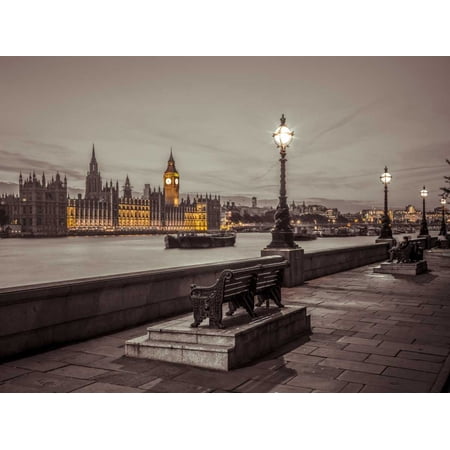 Benchs by the walkway next to river thames London Uk Stretched Canvas - Assaf Frank (18 x 24)