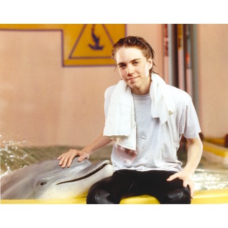 Jonathan Brandis posed with Dolphin Photo Print