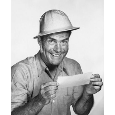 Portrait of a mature man holding a check and smiling Canvas Art - (18 x 24)