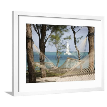 Beach Hammock with Catamaran in Background, Private Island of Le Tuessrok Resort Framed Print Wall Art By Holger Leue