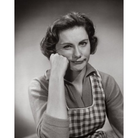 Portrait of a mid adult woman with her hand on her chin Poster Print