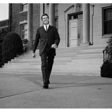 Businessman walking from courthouse Stretched Canvas - (18 x 24)
