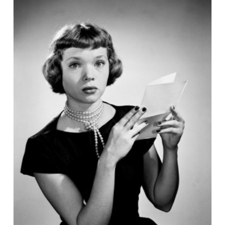 Portrait of young woman holding letter Poster Print