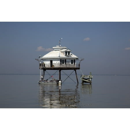 Middle Bay or Mobile Bay Lighthouse Mobile Bay Alabama Due to high labor costs in the post-Civil-War South the lighthouse was prefabricated in the North and then shipped to Mobile Point where it arriv