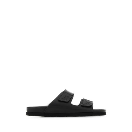 Black leather slippers