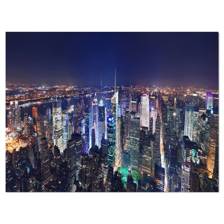 DESIGN ART Designart 'New York City Manhattan night panorama' Cityscapes Photography on Wrapped Canvas - Purple