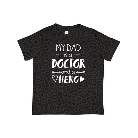 Inktastic My Dad is a Doctor and a Hero Gift Toddler Boy or Toddler Girl T-Shirt
Inktastic My Dad is a Doctor and a Hero Gift Toddler Boy or Toddler Girl T-Shirt