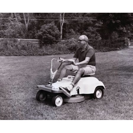 Posterazzi Side profile of a senior man riding a mower in a garden Canvas Art - (24 x 36)