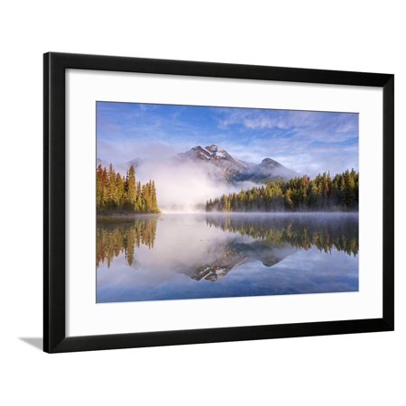 Mist obscures Pyramid Mountain, reflected in Pyramid Lake in the Canadian Rockies, Jasper National Framed Print Wall Art By Adam Burton