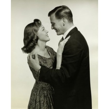 Posterazzi Side profile of a young couple embracing Canvas Art - (24 x 36)