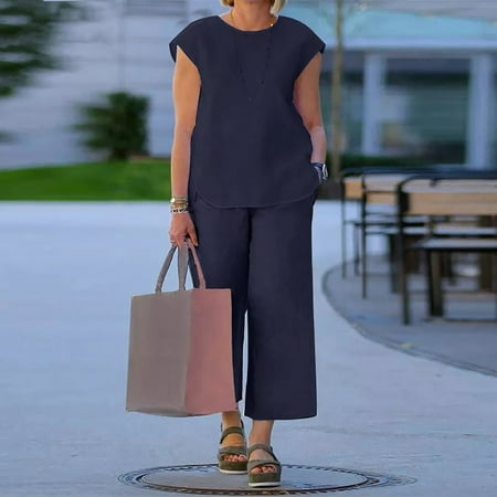 Moxiu Women s 2 Piece Outfits Fashion Round Neck Casual Solid Color Short Sleeve Summer Blouse and Loose Fit Pants Sets
Moxiu Women s 2 Piece Outfits Fashion Round Neck Casual Solid Color Short Sleeve Summer Blouse and Loose Fit Pants Sets