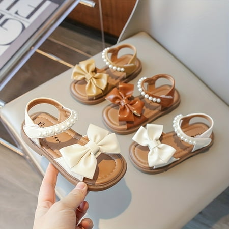 Trendy Cute Pearl Bowknot Decor Open Toe Sandals For Girls Breathable Lightweight Sandals For Vacation Party Spring And Summer
Trendy Cute Pearl Bowknot Decor Open Toe Sandals For Girls Breathable Lightweight Sandals For Vacation Party Spring And Summer