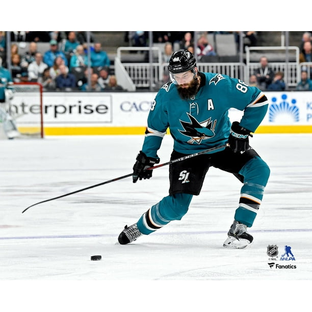Brent Burns San Jose Sharks Unsigned Teal Jersey Shooting Photograph