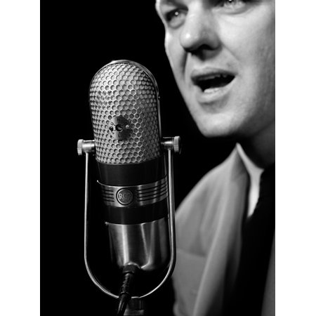 1950s Close-Up Of Man Announcer Talking Into Microphone Newscaster Indoor Symbolic Freedom Of Speech Stretched Canvas - Vintage Images ()