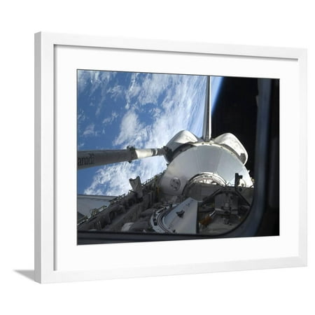 Space Shuttle Discovery Backdropped by Earth's Horizon Framed Print Wall Art