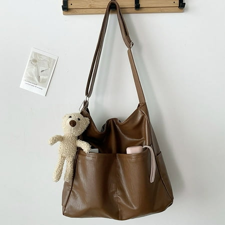 Toyella Women s Large Capacity Textured Soft Leather Bucket Bag Brown soft leather With bear pendant
Toyella Women s Large Capacity Textured Soft Leather Bucket Bag Brown soft leather With bear pendant