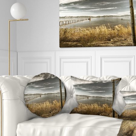 DESIGN ART Designart 'Pier in Brown Lake' Landscape Photo Throw Pillow