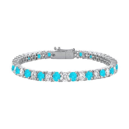 Fine Jewelry Vault UBBRAGRD1311000CZBT Sterling Silver Round Created Blue Topaz and Cubic Zirconia Tennis Bracelet 10 CT