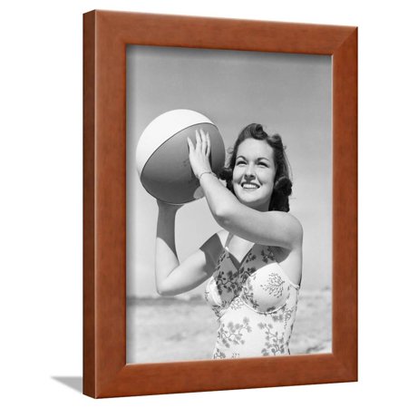 Woman Holding Beach Ball Framed Print Wall Art By Philip Gendreau