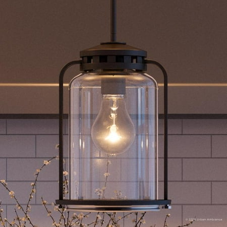 Urban Ambiance Luxury Transitional Pendant Size: 9-3/4 H x 6-1/4 W with Coastal Style Elements Olde Bronze Finish and Clear Seeded Shade UHP2110 
Urban Ambiance Luxury Transitional Pendant Size: 9-3/4 H x 6-1/4 W with Coastal Style Elements Olde Bronze Finish and Clear Seeded Shade UHP2110
