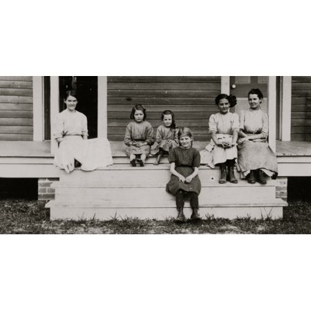 Part of the Nettles family Nine in family Five in the Magnolia Cotton Mills Little girl in front is Lillian Poster Print