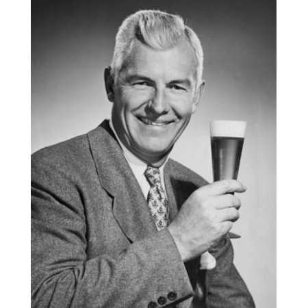 Portrait of a mature man holding a glass of beer Stretched Canvas - (24 x 36)