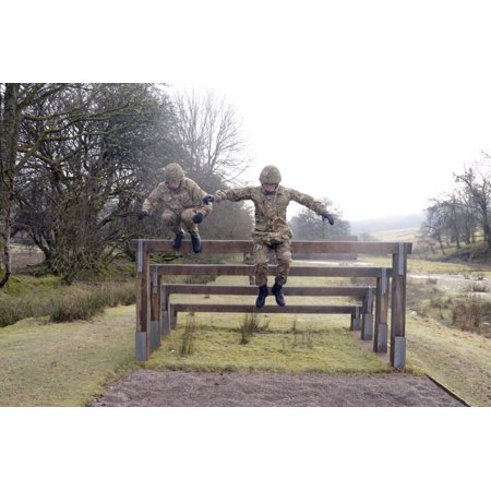 Welsh Guards perform basic training on the assault course at Sennybridge Training Area Stretched Canvas - Andrew ChittockStocktrek Images (18 x 12)