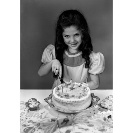 Portrait of girl cutting birthday cake Canvas Art - (18 x 24)