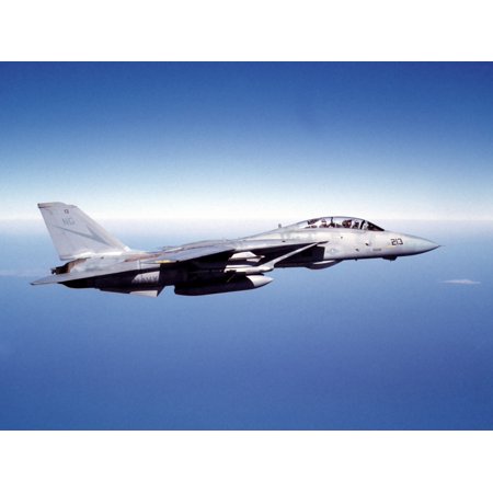 An F-14A Tomcat of the Fighting Renegades of squadron VF-24 flies above the Pacific Ocean off the coast of Southern California headed for a training deployment aboard the aircraft carrier USS Ranger P