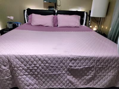 A customer photo showing the soft fit on a memory foam mattress