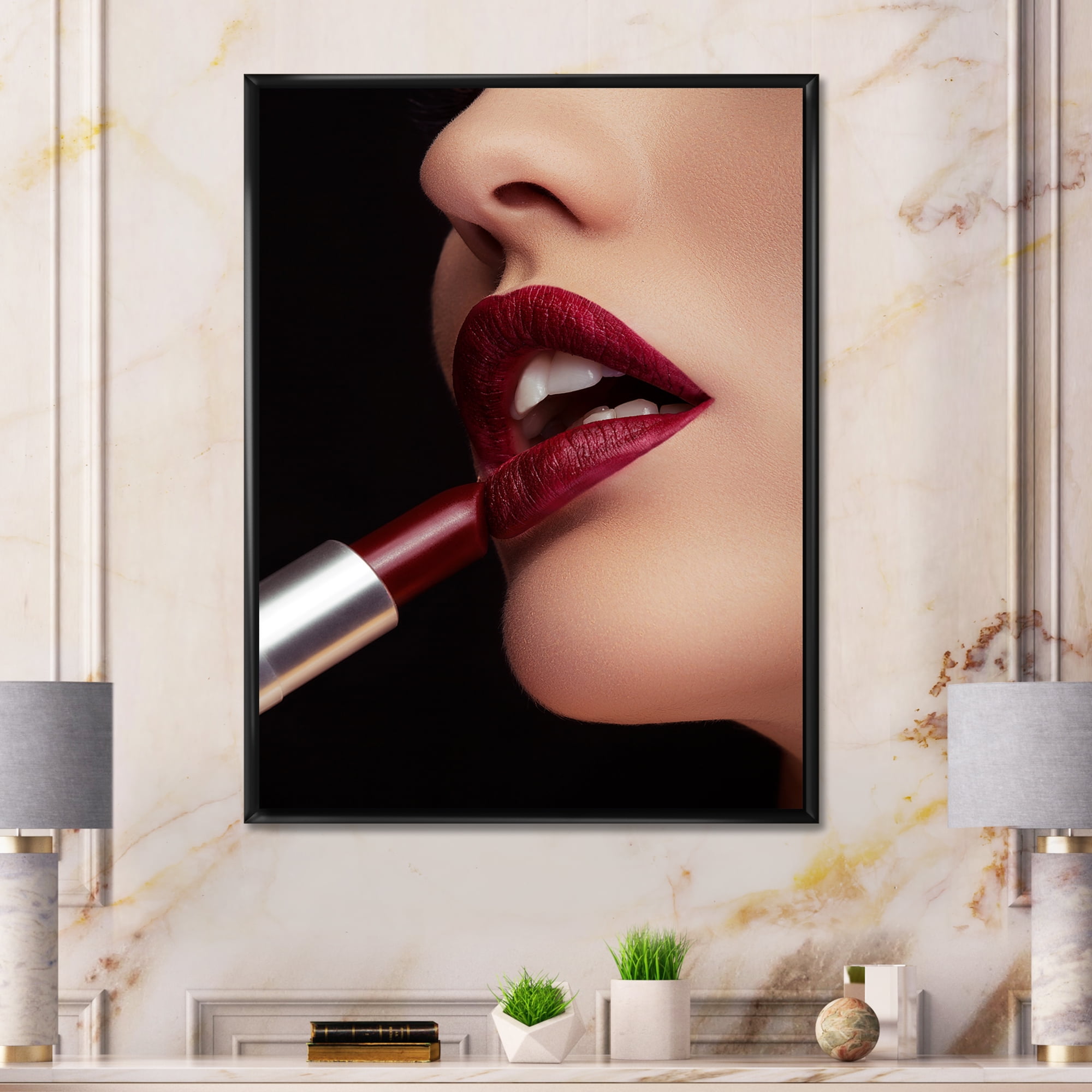 Woman Applying Red Lipstick On Lips I 12 in x 20 in Framed Photography Canvas Art Print, by Designart