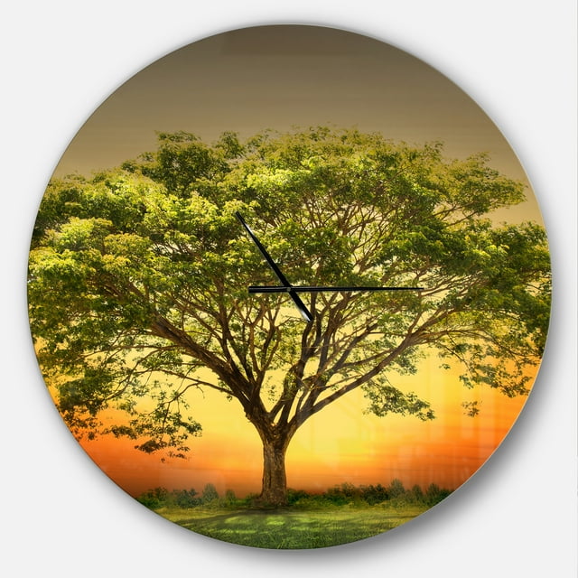 Designart 'Green Tree against Setting Sun ' Modern wall clock