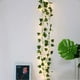thumbnail image 1 of 10M 100 luces LED de cadena hoja de hiedra luz blanca cálida para decoración de fiesta boda jardín Patio dormitorio, 1 of 3
