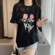 thumbnail image 2 of Youngsters' Black Short Sleeve T-Shirt - Geometric Tulip Floral Print, Breathable Stretchy Fabric, Machine Washable Summer Casual Top for Boys & Girls, 2 of 6