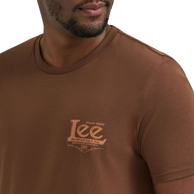 Man wearing brown Lee Men's Graphic Short Sleeve Knit T-Shirt featuring vintage-style logo print on left chest.