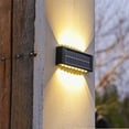 thumbnail image 3 of Lámpara Solar de pared para exteriores, luces Led cálidas, resistente al agua IP65, iluminación luminosa de arriba y abajo para jardín, balcón y patio, decoración exterior, 3 of 4