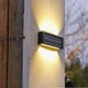 thumbnail image 3 of Lámpara Solar de pared para exteriores, luces Led cálidas, resistente al agua IP65, iluminación luminosa de arriba y abajo para jardín, balcón y patio, decoración exterior, 3 of 4