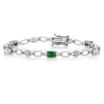 Gem Stone King 925 Sterling Silver Green Created Emerald and White Moissanite and Round White Lab Grown Diamond Tennis Bracelet for Women (2.59 Cttw, Gemstone Birthstone, Oval 6X4MM, 7.25 inches)