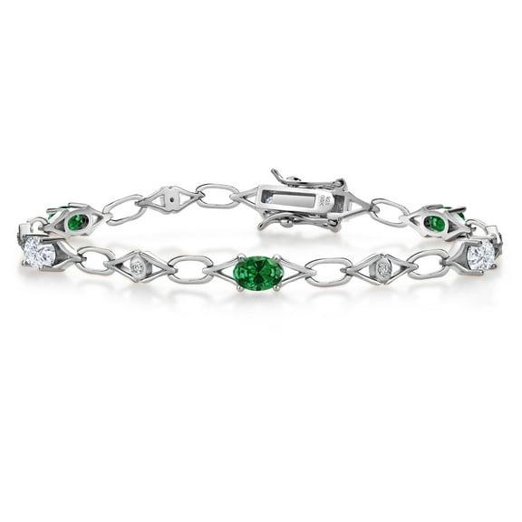 Gem Stone King 925 Sterling Silver Green Created Emerald and White Moissanite and Round White Lab Grown Diamond Tennis Bracelet for Women (2.59 Cttw, Gemstone Birthstone, Oval 6X4MM, 7.25 inches)