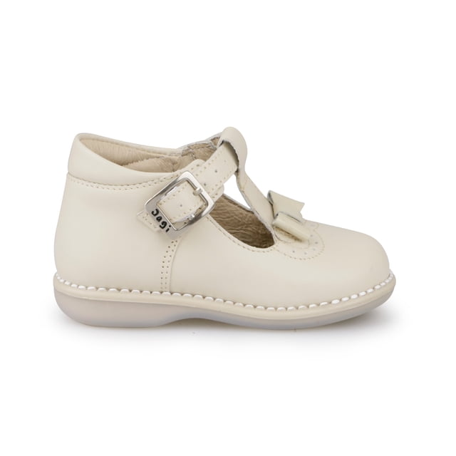 Zapatito cerrado para niña elaborado en piel natural con correa de hebilla, detalle de moño en empeine y suela antiderrapante Dogi Zapato