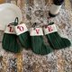 thumbnail image 5 of Bolsa de regalo de lana con bordado de huella de perro y copo de nieve, calcetín navideño verde con caramelos, bolsa de regalo plegable y portátil, estilo calcetín de punto, tela de alta, 5 of 6