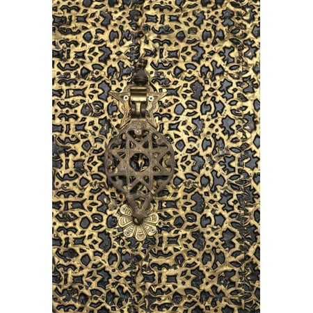 Ornate Brass Wall - Morocco. Detail of an ornate brass door and fancy door knocker. Print Wall Art By Brenda Tharp