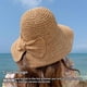 thumbnail image 3 of Qarigey Lady Summer Sombrero de paja Bowknot Floppy Wide Brim Sun Hats Playa Deporte Ahuecado Plegable De moda para damas adultas Sombreros Naranja M (56-58 cm), 3 of 6