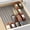 Gray, variant on YouCopia SpiceLiner® Spice Drawer Liner, 10ft Roll, Sandstone, for Spice Bottle and Jar Storage