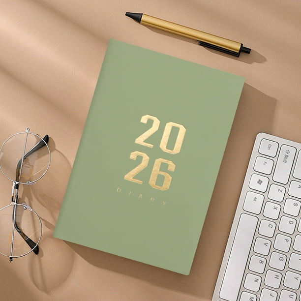 Planificador de horarios 2026 con notas de fecha Libro de horarios en papel
