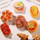 thumbnail image 2 of Nvzi Mini figuras de resina que imitan pan frito (10 unidades) - 0,98 * 0,51 * 0,32 pulgadas, comida de resina realista, ideal para decorar joyas, clips y mini paisajes., 2 of 5